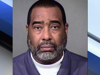 Earl Dennison Woods Jr. is accused of making a false bomb threat at the government building where he work