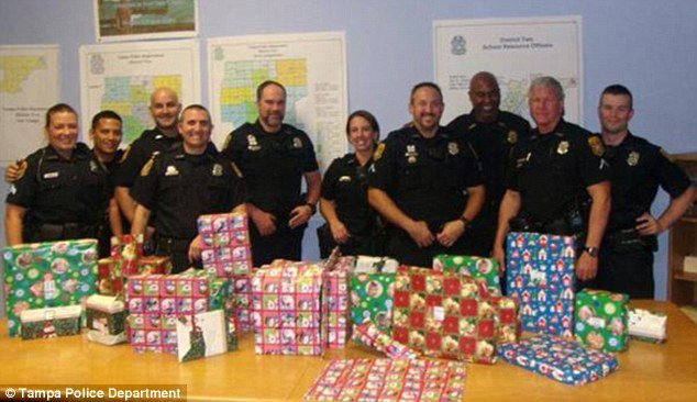 Florida police officers stepped in to donate presents to the family whose Christmas gifts and dog were stolen