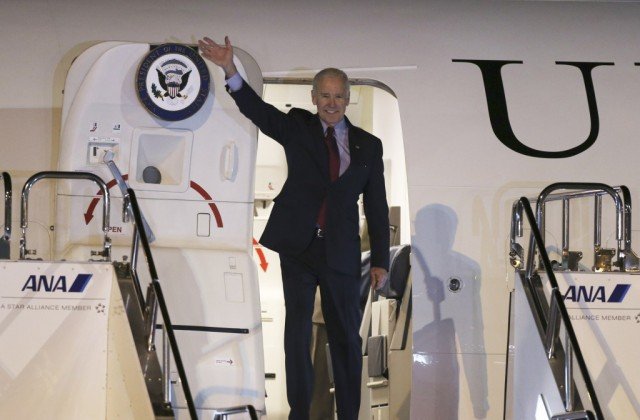 Joe Biden arrived in Tokyo late on Monday and will then head to Beijing and Seoul during his six-day visit