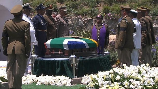 Nelson Mandela's body has been buried in a family plot in Qunu