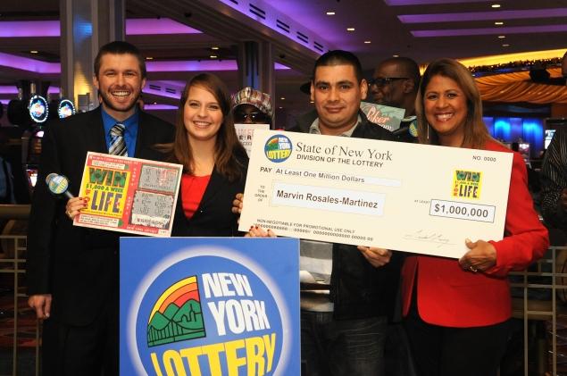 New York Lottery officials cut Marvin Martinez a check for the winning ticket he found raking leaves last November in the wake of Superstorm Sandy