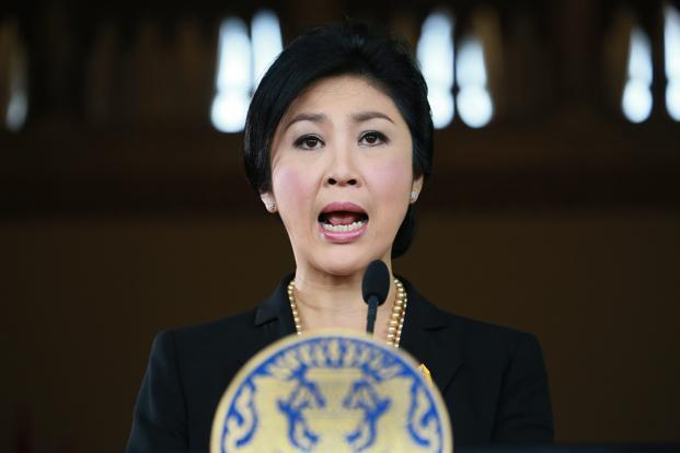 PM Yingluck Shinawatra has rejected protesters' demands that she step down, amid ongoing clashes in Bangkok