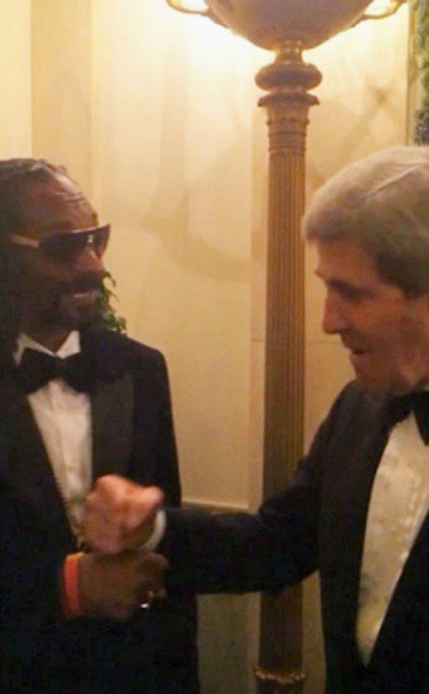 Snoop Dogg fist bumped with Secretary of State John Kerry during a party at the White House