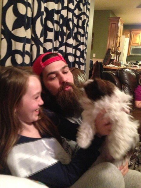 Jep Robertson and his daughter Lily Lulu with their new dog Gizmo