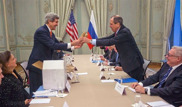 John Kerry presented two large Idaho potatoes as a gift for Russian Foreign Minister Sergei Lavrov during a meeting in Paris
