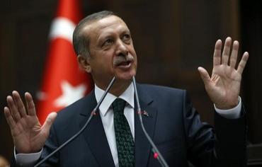 PM Recep Tayyip Erdogan says he favors the retrial of hundreds of military officers convicted of plotting to overthrow the government