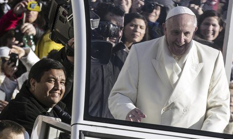 Pope Francis invited Father Fabian Baez to join him on his Popemobile at the Vatican