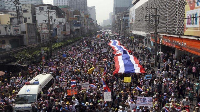 Thai protesters have surrounded polling stations, blocking early voting ahead of next week's general election