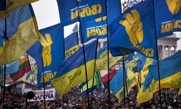 Thousands of Ukrainians have rallied in Kiev in the first anti-government protest of 2014