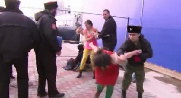 Five members of punk group Pussy Riot and a cameraman were attacked by Cossack security patrols in Sochi