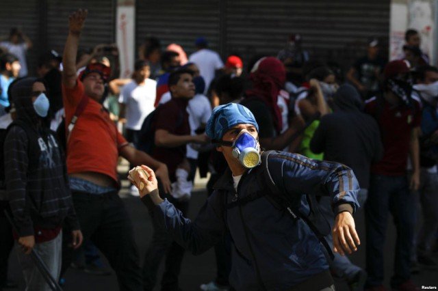 The number of deaths which can be connected to two weeks of anti-government protests in Venezuela has risen above 50, President Nicolas Maduro has said