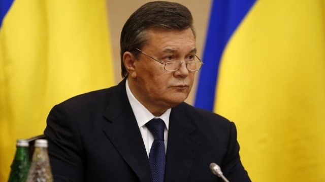 Viktor Yanukovych has made his first public appearance since being removed from office at a news conference in Russia