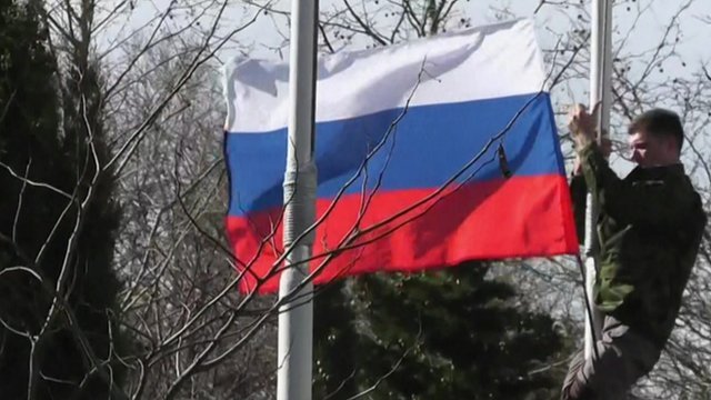 Activists put Russian flag at the Sevastapol navy base 