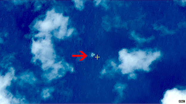 China has released satellite images of possible debris from the missing Malaysia Airlines flight MH370