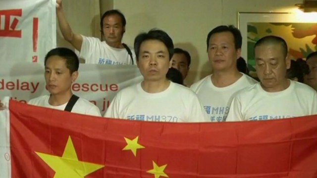 Families of Chinese passengers from the missing flight MH370 have vented their anger at Malaysian government officials