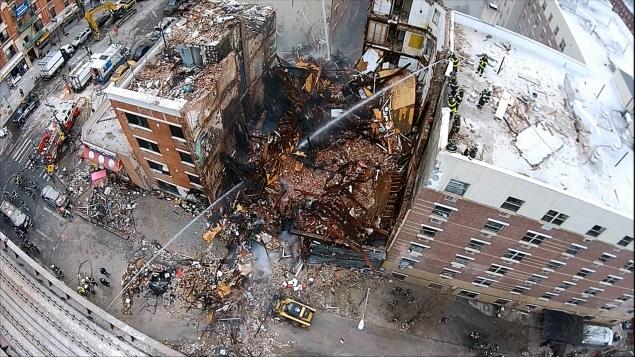 Firefighters are trying to find further victims, with the death toll expected to rise at the Harlem explosion site