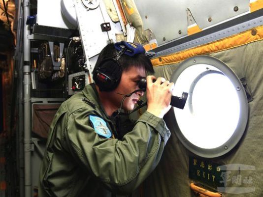 Four planes were trying to check whether two objects seen on satellite images were debris from flight MH370