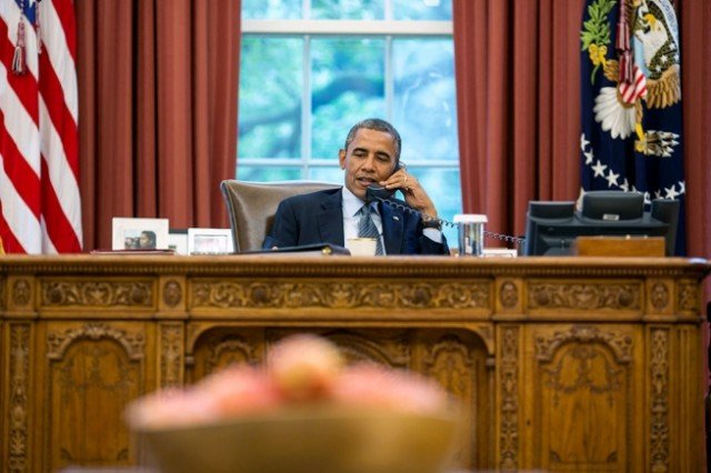 In a 90-minute phone conversation, Barack Obama urged Vladimir Putin to pull forces back to bases in Crimea