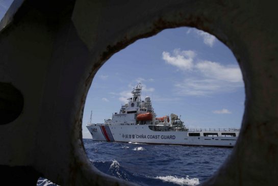 Journalists on board of the Philippine ship have witnessed Chinese coast guard vessels trying to block access to a disputed shoal in the South China Sea
