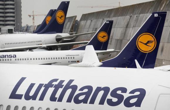 Lufthansa pilots have voted to strike in a long-running dispute over pay and working conditions