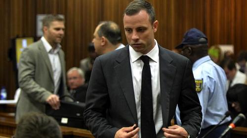 Oscar Pistorius was praying over the body of his girlfriend Reeva Steenkamp as she lay dying