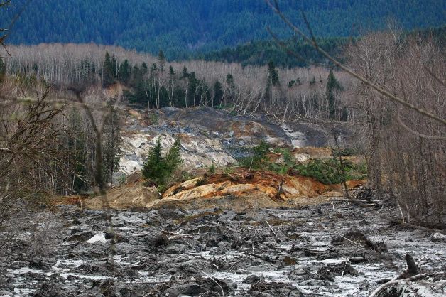 Washington authorities have found six more bodies after Saturday's huge landslide