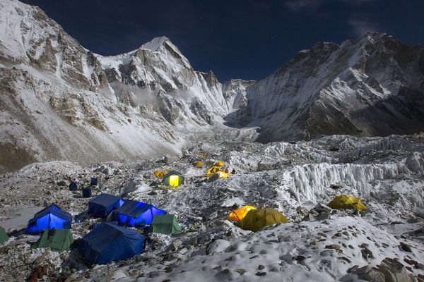About half of expedition teams at Everest base camp are descending amid uncertainty over this year's climbing season