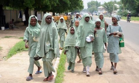 Boko Haram gunmen abducted around 100 schoolgirls in an attack on a school in north-east Nigeria