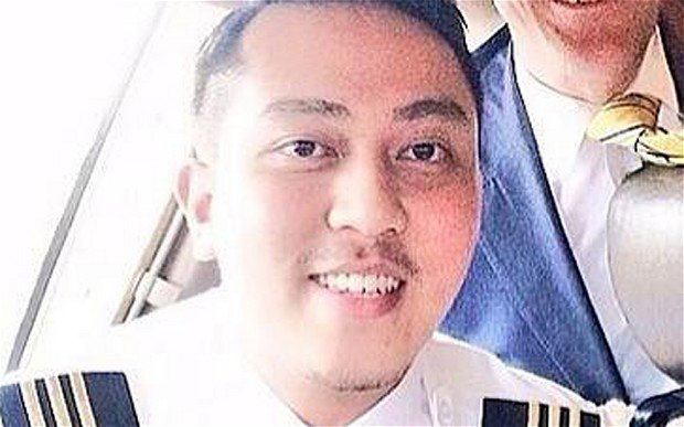 Malaysia Airlines flight MH370 co-pilot Fariq Abdul Hamid tried to make a call with his cellphone after the plane was diverted from its scheduled route