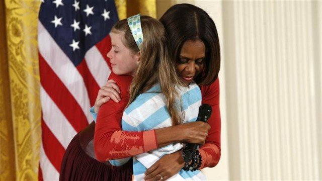 Michelle Obama invited Charlotte Bell on stage and gave her a hug