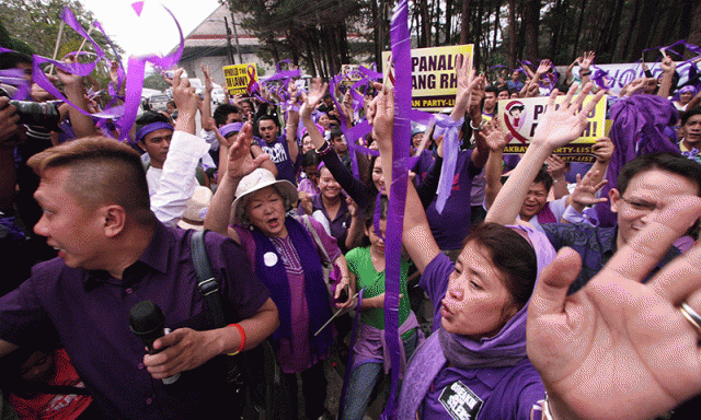 Philippine top court has approved a birth control law, in a defeat for the Catholic Church