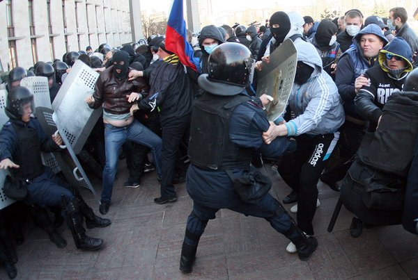 Pro-Russian protesters clashed with police, waved Russian flags and called for a referendum on independence from Ukraine