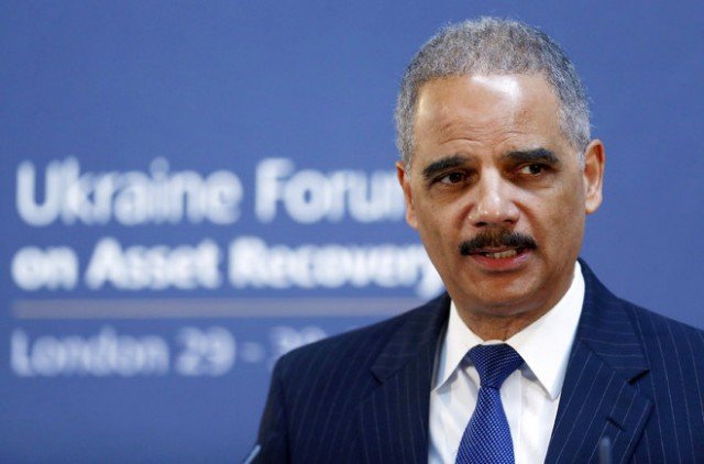 Eric Holder said the US government categorically denounces economic espionage as a trade tactic