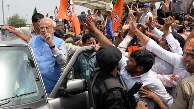 Narendra Modi was cheered by supporters after a victory parade from Delhi airport
