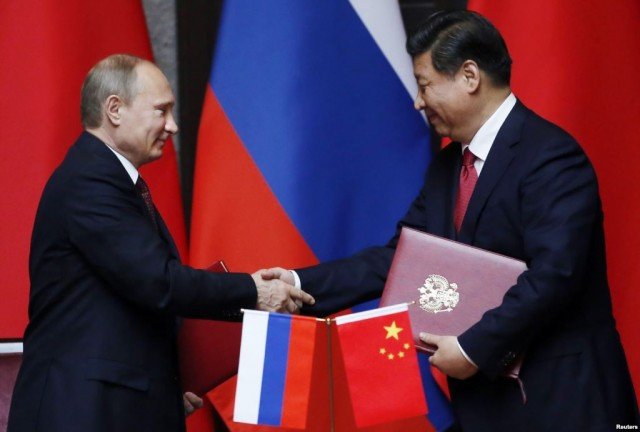 Russian President Vladimir Putin has signed a huge gas supply contract with China during his visit to the Asian country
