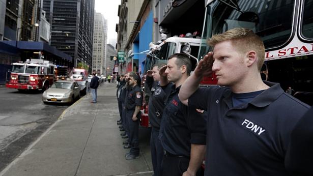 The unidentified remains of 9/11 victims returned to the World Trade Center site in a solemn procession