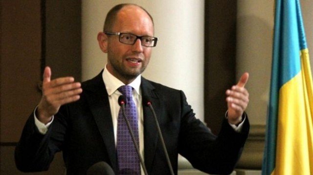 Ukraine’s PM Arseniy Yatsenyuk has called on Russia to control its border to stop terrorists from crossing into his territory