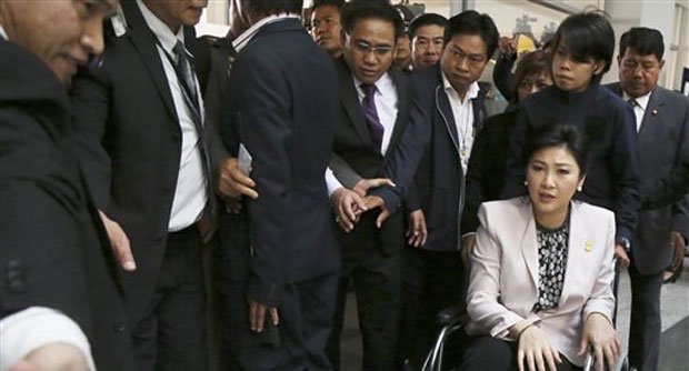 Yingluck Shinawatra is one of more than 100 political figures summoned by the army