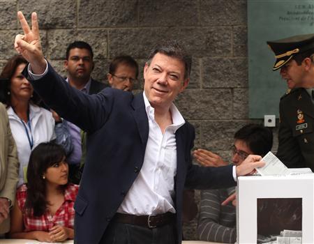 Juan Manuel Santos has been re-elected as Colombia's president in the most dramatic presidential contest in years