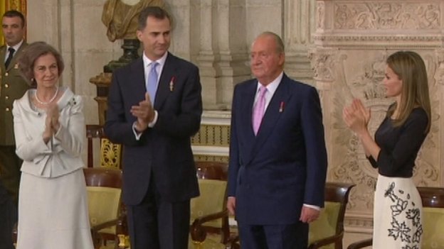 King Juan Carlos of Spain signed the bill of his abdication in favor of his son, Crown Prince Felipe