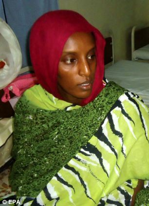 Meriam Ibrahim has been detained with her family at Khartoum airport after she was freed from death row