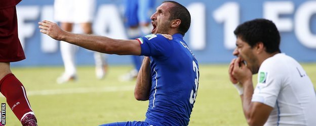 Uruguay's striker Luis Suarez appeared to bite Italy's Giorgio Chiellini during their Group D clash at the World Cup tournament in Brazil