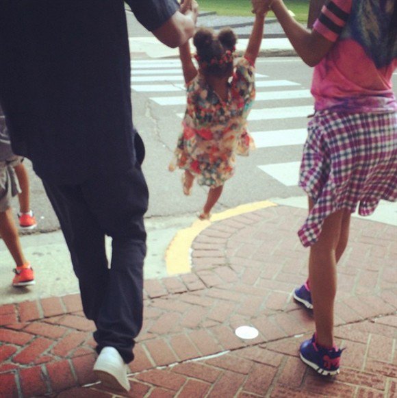 Beyonce posted family photo of her and husband Jay-Z both holding hands with their daughter Blue Ivy on each side