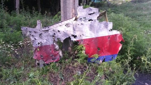 The downed Malaysia Airlines plane in eastern Ukraine suffered an explosive loss of pressure after it was punctured by shrapnel from a missile