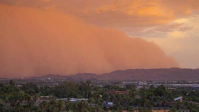 The huge sandstorm covered the Greater Phoenix, knocking out power to 12,000 residents, and delaying flights