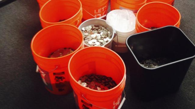 Adriana's Insurance Services settled a lawsuit with 17 buckets of coins, said to contain $20,000