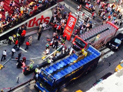 At least 14 people have been injured after two double-decker buses collided in Times Square