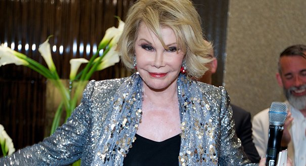 Joan Rivers was rushed to the hospital after she stopped breathing while undergoing a procedure on her vocal chords
