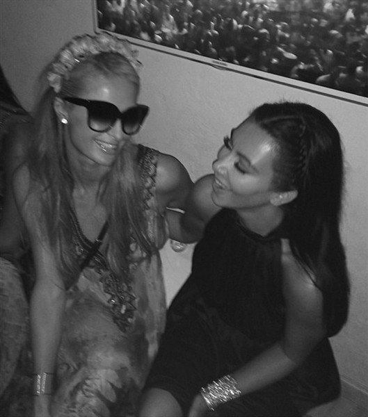 Kim Kardashian and Paris Hilton reunited in Ibiza at designer Riccardo Tisci's birthday party, and appeared to pick up where they'd left off