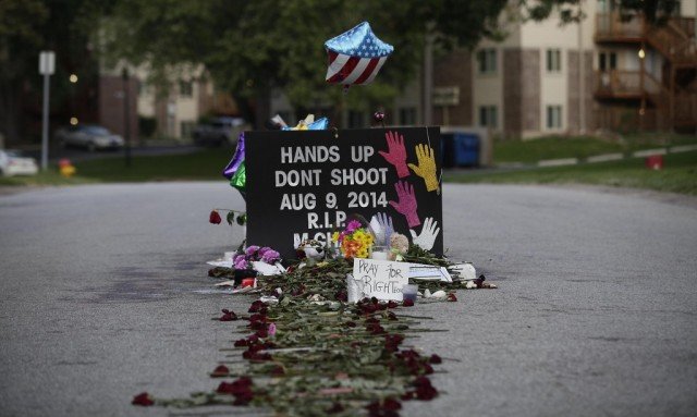 Michael Brown was killed on August 9 after being stopped by a white police officer for walking in the middle of the street